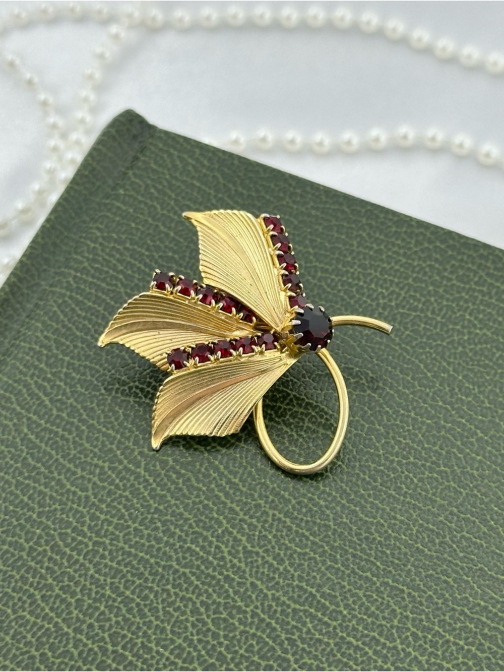 Gold Leaf Brooch with Red Stones